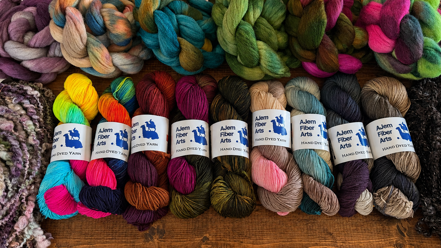AJem Fiber Arts hand dyed yarn, combed top, and art yarn colorways